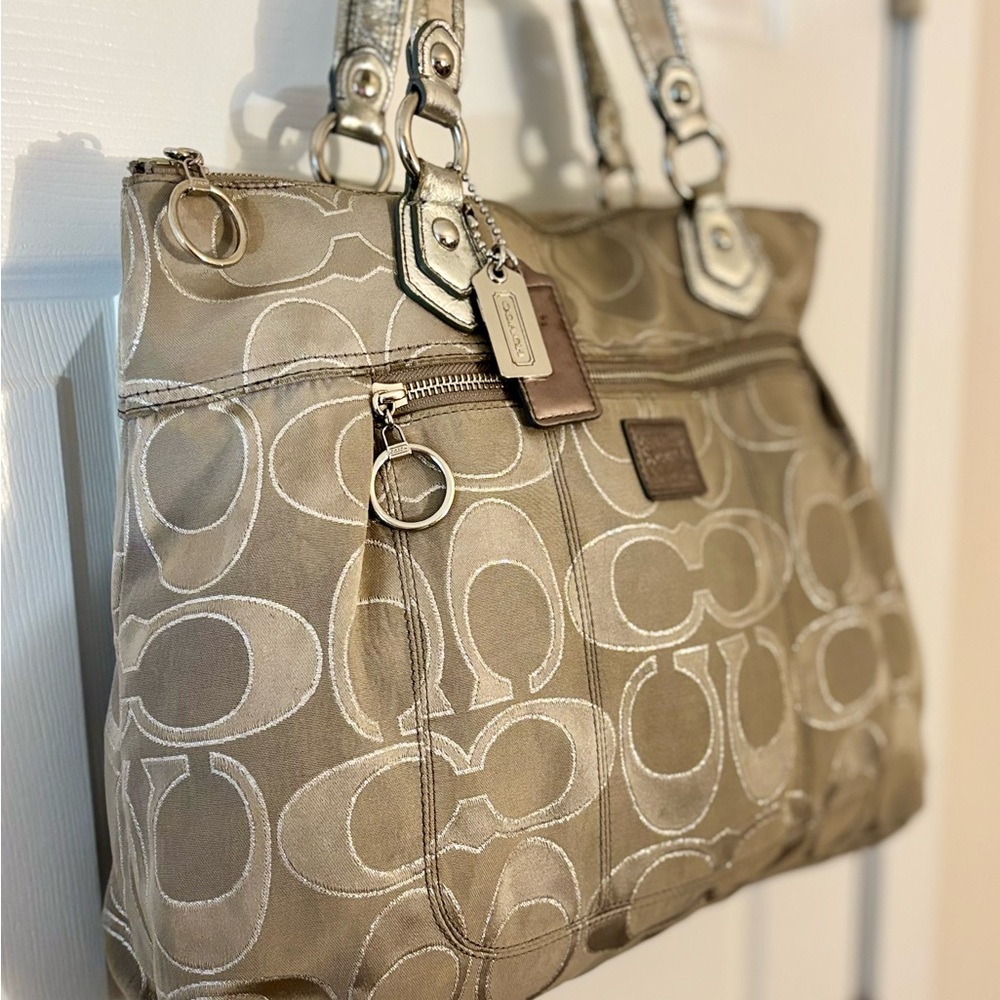 COACH's Signature Tote Bag silver wide zipper pocket